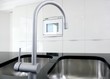 kitchen faucet and oven modern black and white