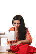 Seamstress work on the sewing-machine Seamstress work on the sewing-machine