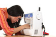 Seamstress work on the sewing-machine Seamstress work on the sewing-machine