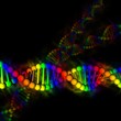DNA - deoxyribonucleic acid on black background DNA - deoxyribonucleic acid on black background