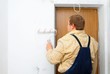 worker painting wall with roller worker painting wall with roller