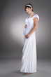 beautiful pregnant bride in wedding dress