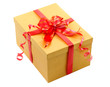 golden gift box with red bow isolated on white golden gift box with red bow isolated on white