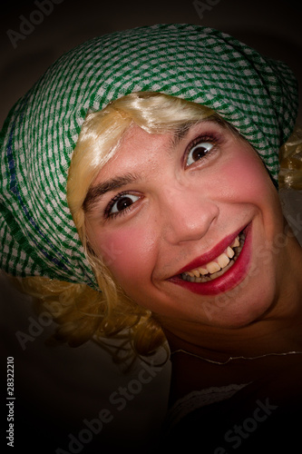 Photo: Funny face of a man dressed as a woman Funny face of a man dressed as a woman