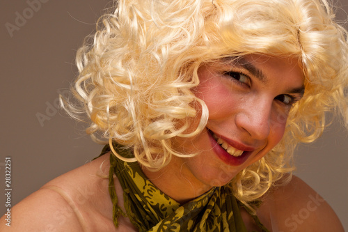 Photo: Funny face of a man dressed as a woman Funny face of a man dressed as a woman