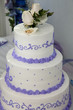 Wedding cake and topper with wedding rings