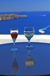 Wine Glasses - Santorini background Wine Glasses - Santorini background