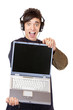 Jugendlicher mit Kopfhörer und Computer empfiehlt Musik download Jugendlicher mit Kopfhörer und Computer empfiehlt Musik download