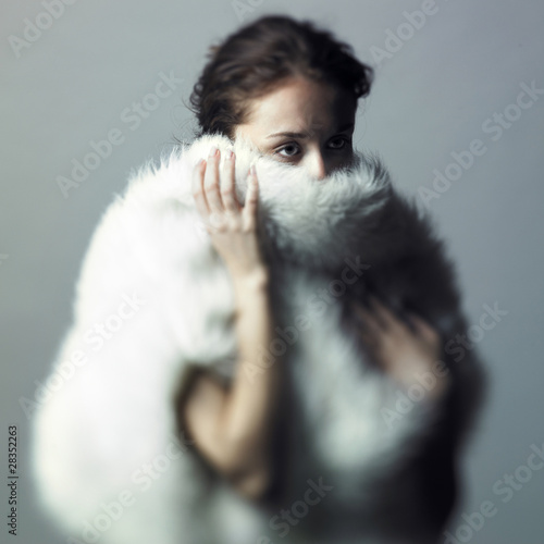 Photo: Gentle girl with white fur Gentle girl with white fur