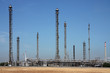 pipes and chimney in oil refinery and agriculture field