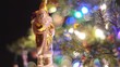 Santa Ornament Hanging on Christmas Tree