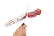 découpage d'un saucisson sec
