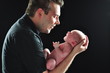 Father Holding Newborn Baby Father Holding Newborn Baby