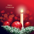 Christmas decoration with candle and red bauble