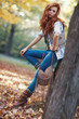 Young slim woman autumn portrait