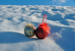 christmas baubles in the snow