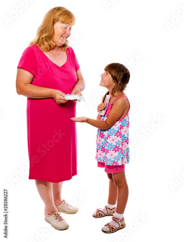 Photo: Grandmother giving money Grandmother giving money