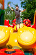 Boy in inflatable playground