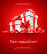 gift in box with red ribbon and bow