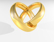 Heart made by gold shiny wedding rings