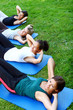 young and attractive people doing fitness exercises