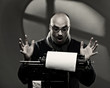 Old fashioned bald writer in glasses writing book, sepia