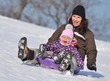 mère et bébé  a traîneau