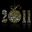 New 2011 year symbol made of gold snowflakes