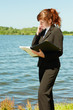 Photo: Business lady working outdoor Business lady working outdoor