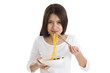 asian woman eating with chop sticks