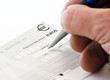 hand signing a check