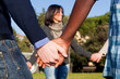 Multiracial Young People Holding Hands in a Circle