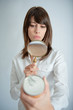 Woman scrutinizing nutrition label