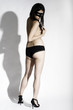 Masked woman standing