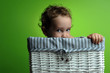 Baby sitting in a basket