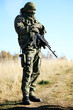 Photo: Soldier in camouflage Soldier in camouflage