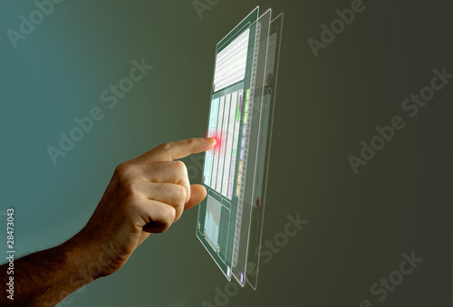 Photo: businessman points on a future screen businessman points on a future screen