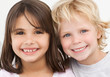 Portrait of two happy children in the kitchen Portrait of two happy children in the kitchen