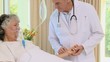 Doctor taking the pulse of his patient