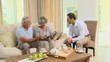 Seniors talking with a man