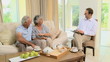 Old couple talking with a man