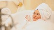 Beautiful woman relaxing in the bath