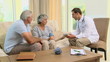 Video: Doctor measuring blood pressure at a patient Doctor measuring blood pressure at a patient