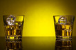 Whisky glasses in yellow tint