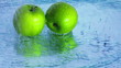 Apples under running water