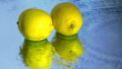 Lemons are reflected in the flow of water