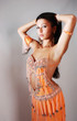woman in belly dance orange dress