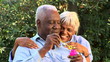 Video: Close up of senior couple blowing bubbles outdoors Close up of senior couple blowing bubbles outdoors