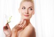 Beautiful blond woman with white lily flower Beautiful blond woman with white lily flower