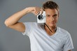 Young man with a camera